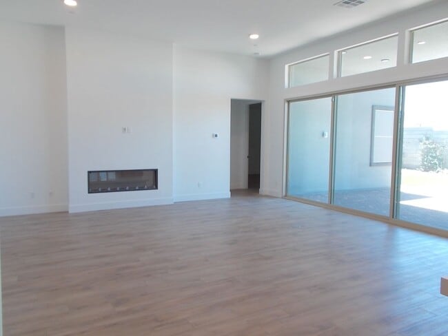 Building Photo - Luxury Brand-New Home with Designer Finishes, Courtyard & Bonus Game Room