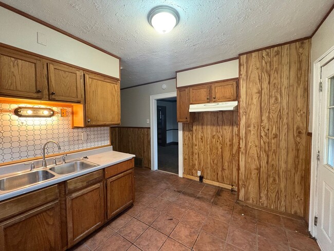 Building Photo - Section 8 Welcome – Freshly Turned 4BR Home in Garfield Heights | $1,695/mo