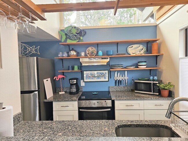 Building Photo - Furnished Waterfront Bungalow with Pool Ac...