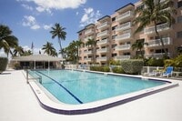 Building Photo - 3 Bedroom 2 Bathroom unfurnished Condo pool view