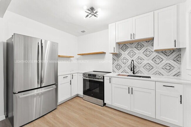 Building Photo - Charming Newly Renovated 2-Bedroom Home Ne...