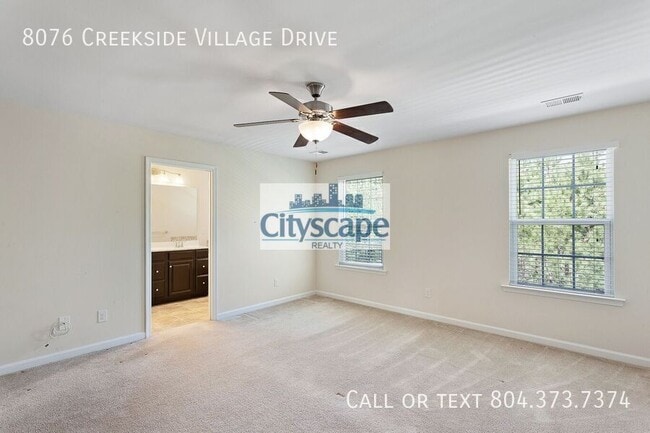 Building Photo - 8076 Creekside Village Dr