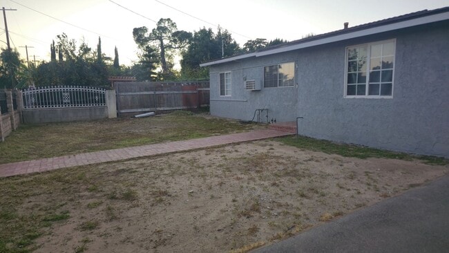 Building Photo - Single-Family 2BR Home with Garage & EV Charging