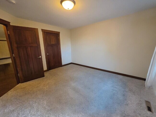 Building Photo - FREE SEPTEMBER RENT for this Spacious 4-Bedroom Home with Vaulted Ceilings with Finished Basement...