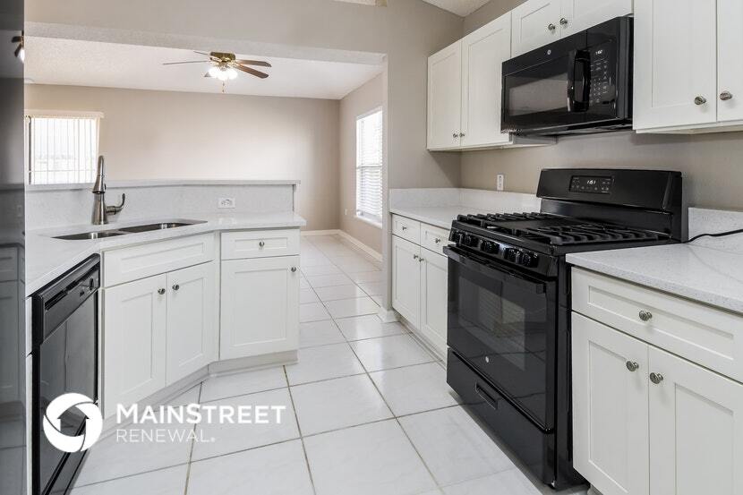 Building Photo - 7360 Lawn Tennis Ln