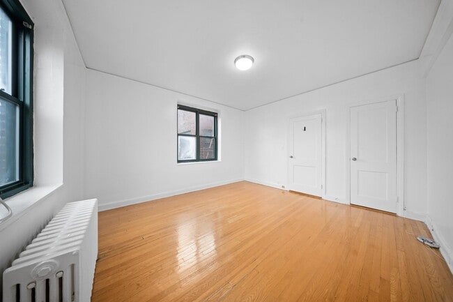 Building Photo - 34-40-40 79th St