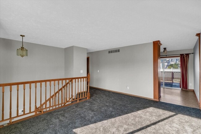 Building Photo - Spacious 4-Bedroom Home with Fenced Yard a...