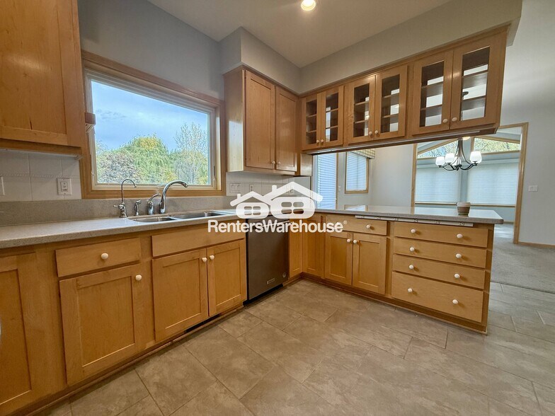 Building Photo - 9536 Windflower Pl N