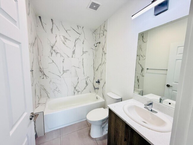 Building Photo - 1295 W 69th St