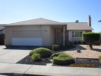 Building Photo - Nice Floorplan, Cute Yards - 4 Bedroom/2 B...