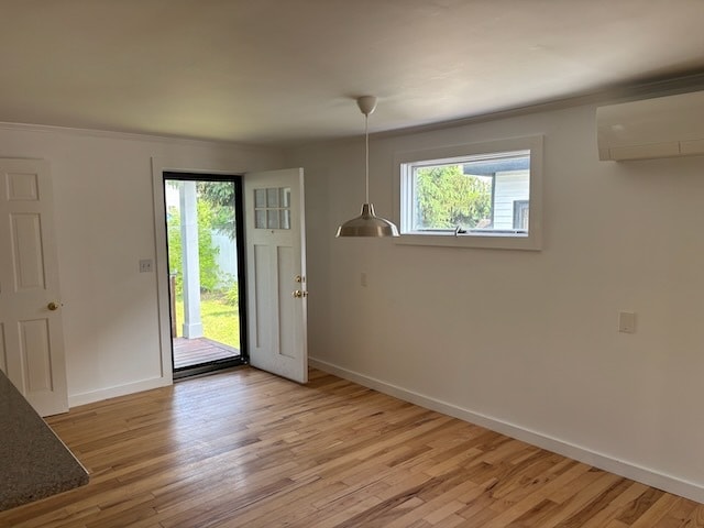 The dining room from the living room / kitchen entrance. Also shown: the entrance to the backyard - 52 Rose St