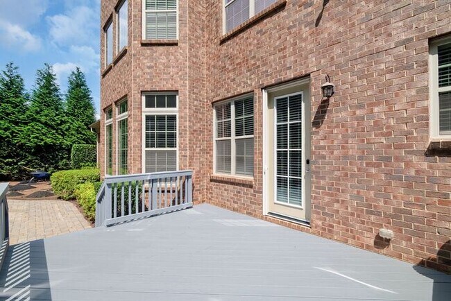 Building Photo - Stunning All-Brick Home in BridgeMill Community!