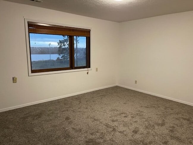 Building Photo - Waterfront! Sunset views! 3 bdrms! Attached garage! Private driveway!