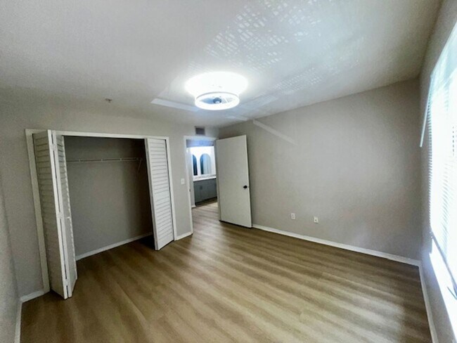 Building Photo - NEW-Remodeled bathroom & kitchen! NEW VINYL PLANK flooring & fresh paint! 2 bedroom 1 bath condo ...