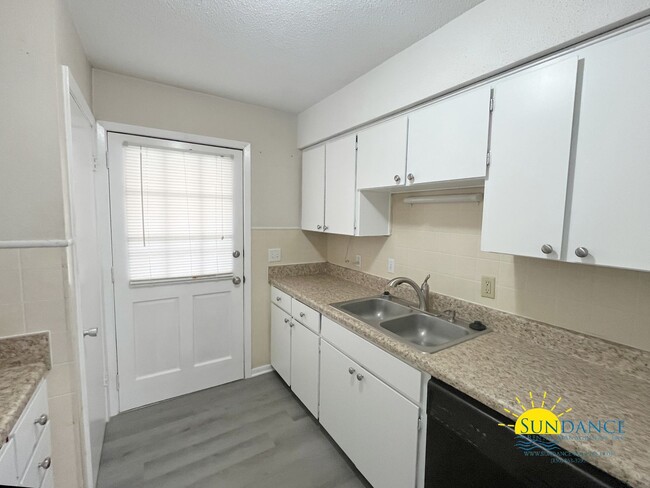 Building Photo - Spacious 3-Bedroom Condo with Community Am...