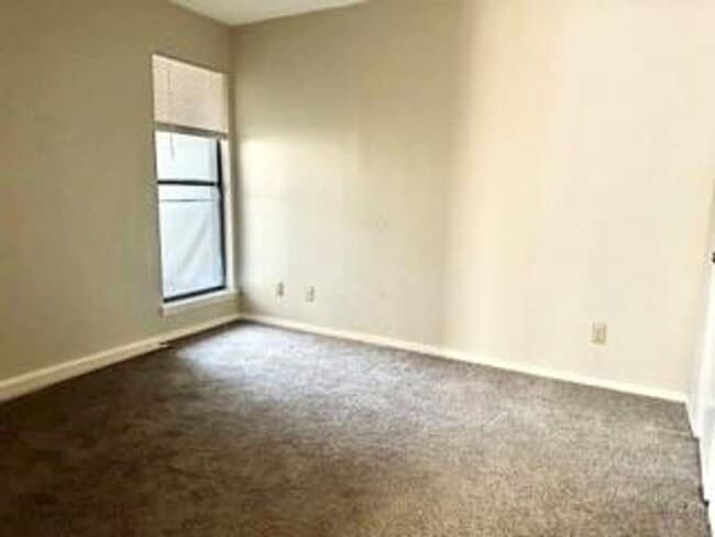 Building Photo - First-Floor 2BR/2BA Condo in Plano with Fireplace + 2 Carports