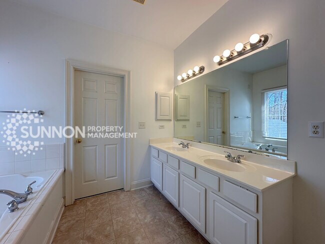 Building Photo - Wooded, Charming 3 Bedroom with Tons of Space