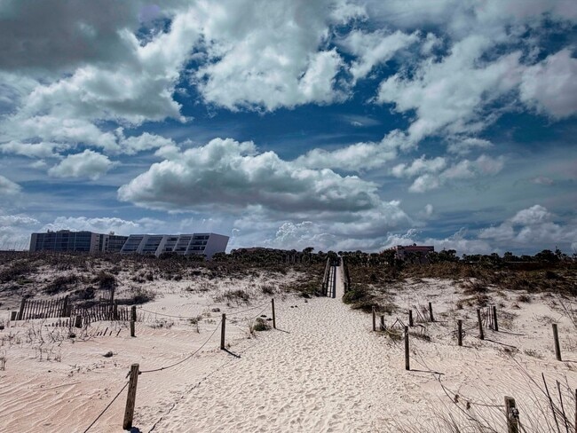 Building Photo - Beautifully Renovated, Fully Furnished Beach Condo just a short walk from the ocean.