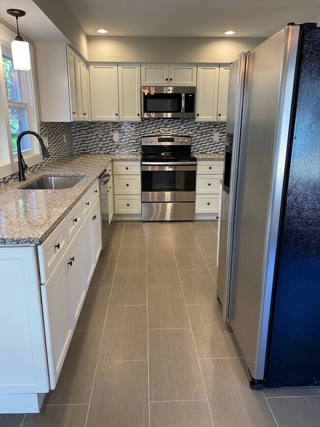 Building Photo - Central AVL - Farmhouse Charm, Modern Amen...