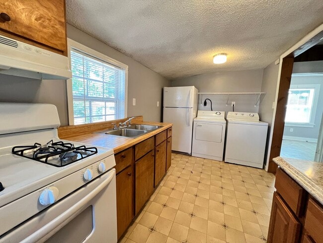 Building Photo - You’re here. You’re home. You’re happy.