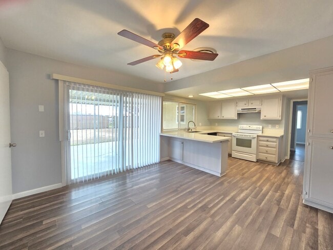 Building Photo - For Rent: Spacious 4-Bedroom / 3 Full bathrooms /  Home with Covered Patio & Modern Upgrades