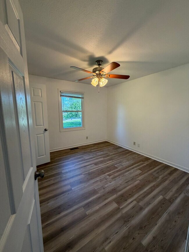 Building Photo - Situated in the heart of Sango, massive lot, and includes a fully finished & recently remodeled b...