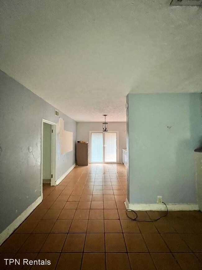 Building Photo - 4 br, 2 bath House - 6259 S. Lakeshore Dr.