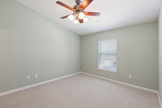 Building Photo - Beautifully Updated & Spacious 3BR/2BA Condo in a Secure Gated Community — Includes Cable, Intern...