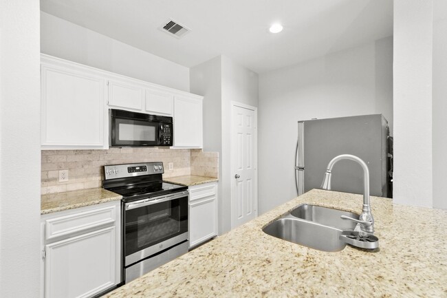 Building Photo - Stylish 2-Bed, 2-Bath Home with Unique Ups...