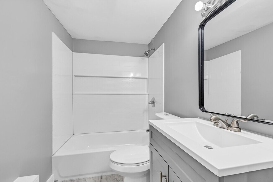 Full bathroom with brand new tub on the first floor - 844 E 37th St