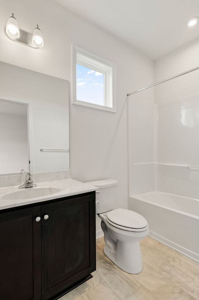 Building Photo - Modern End-Unit Townhome in Rocketts Landing – Prime Richmond Location