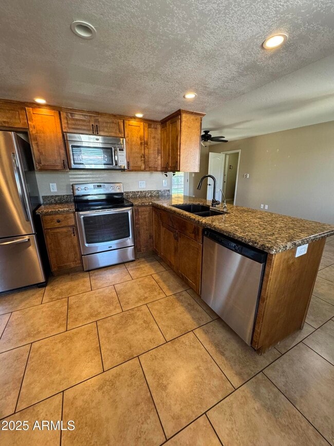 Building Photo - 3753 E Charter Oak Rd