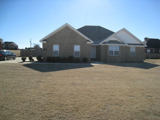 Primary Photo - Large fenced back yard with patio