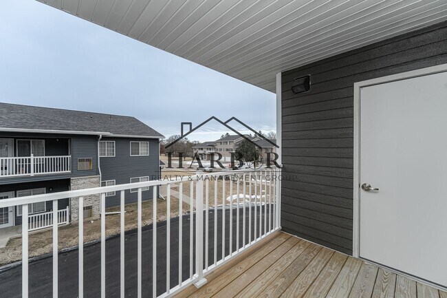 Building Photo - Brand NEW Caroline Apartments 201 -  Move ...