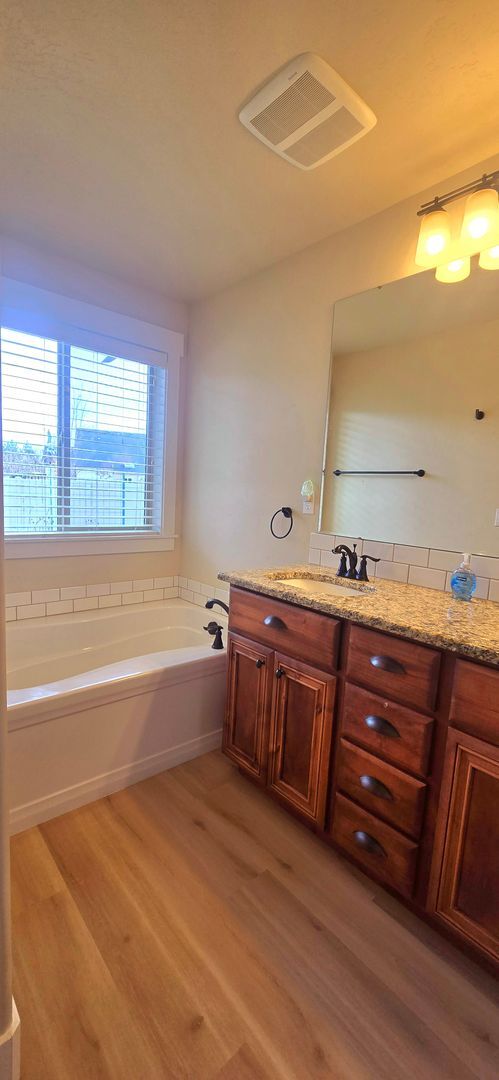 Building Photo - THREE-CAR GARAGE! This charming home offers 3 bedrooms, plus an office/rec room, and 2 bathrooms.