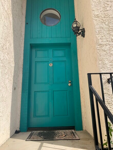 Front door with brass eye spec - 5246 Calderon Rd