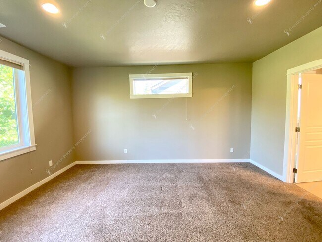 Building Photo - Bright, Spacious Home with Expansive Yard ...
