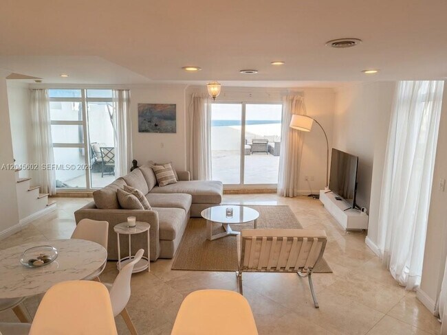 Building Photo - 7600 Collins Ave