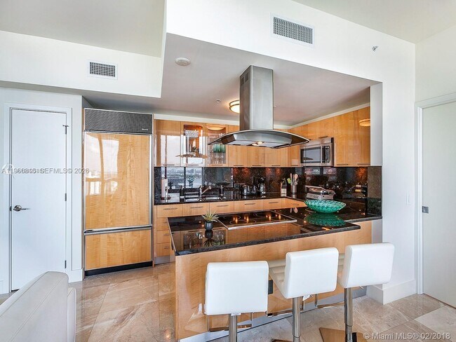 Building Photo - 6899 Collins Ave