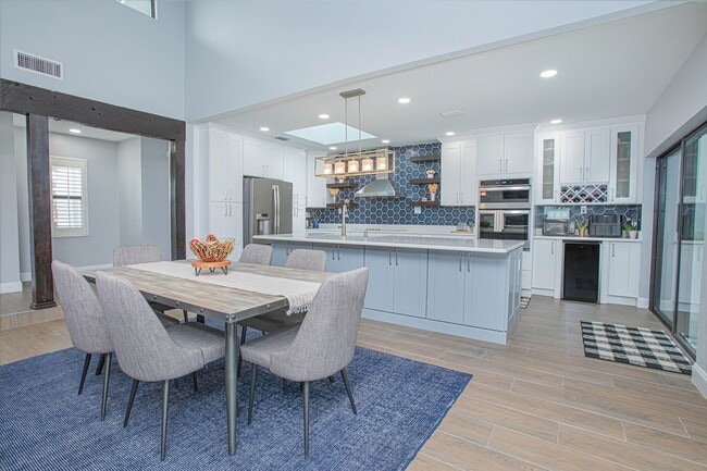 Building Photo - Beautifully Updated 3/2 Pool Home with Large Backyard in Lake Ajay (Gated Community)