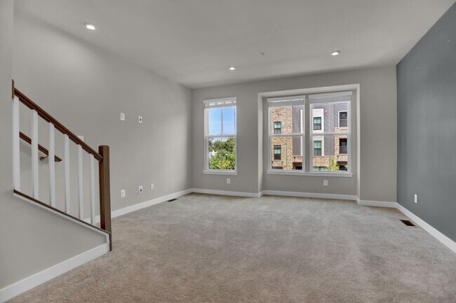 Building Photo - Luxury 4-Story Townhome with Rooftop Terrace!