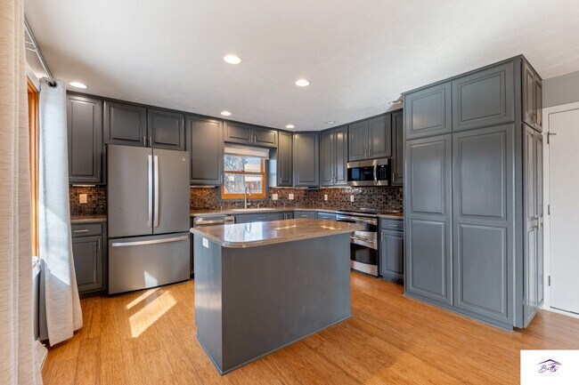 Building Photo - Available now! Spacious 3 Bed, 3 Bath Home with Modern Open Layout & Lawn Care Included