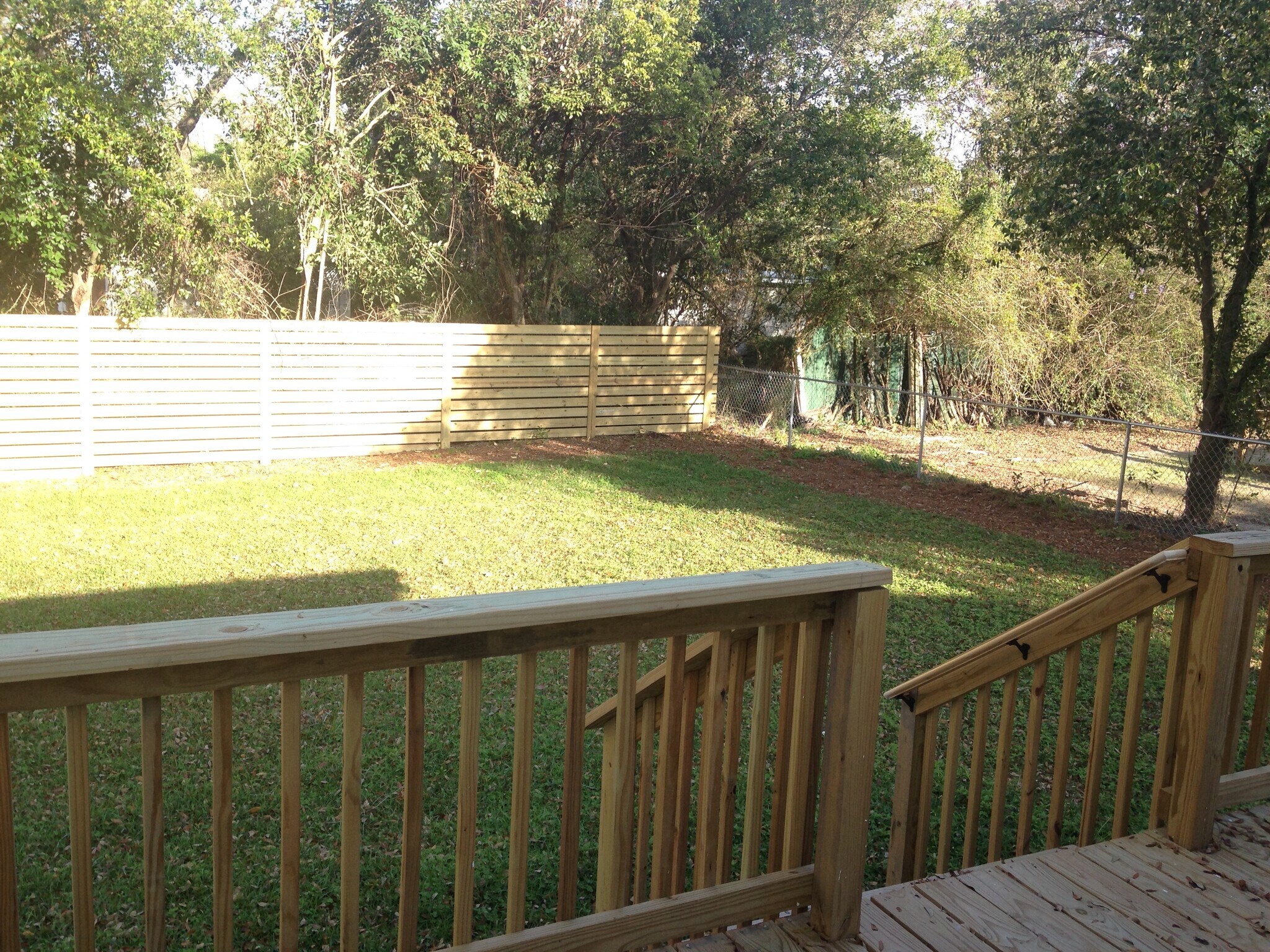Deck overlooks fully fenced large backyard - 1533 Yancey Street