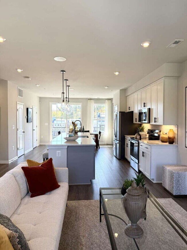 Building Photo - Be the First to Live Here! Brand-New 3BR Condo in Coalfield Station – Modern Living in the Heart ...