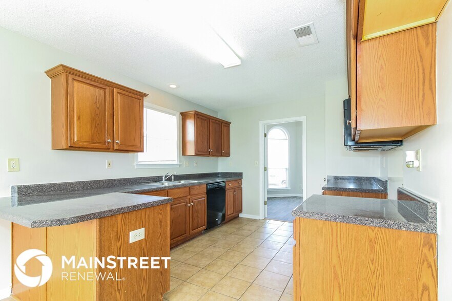 Building Photo - 7299 Pinnacle Oaks Dr