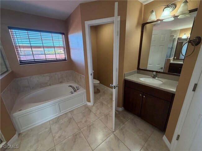 Building Photo - 16511 Whispering Trace Ct