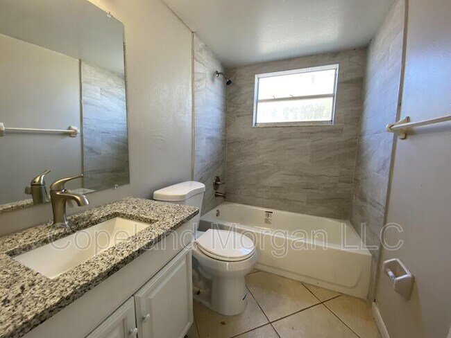 Building Photo - 5615 E 127th Ave