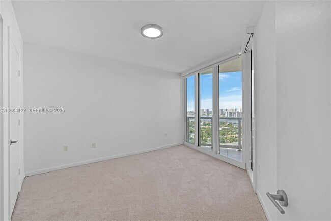 Building Photo - 19333 Collins Ave