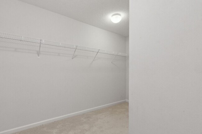 Building Photo - Spacious 4-Bedroom Home in Amelia Walk wit...
