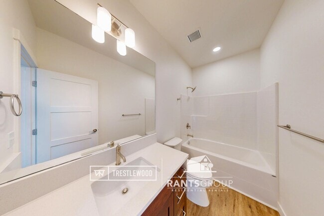 Building Photo - Brand New! Modern Home in Trestlewood – Wh...